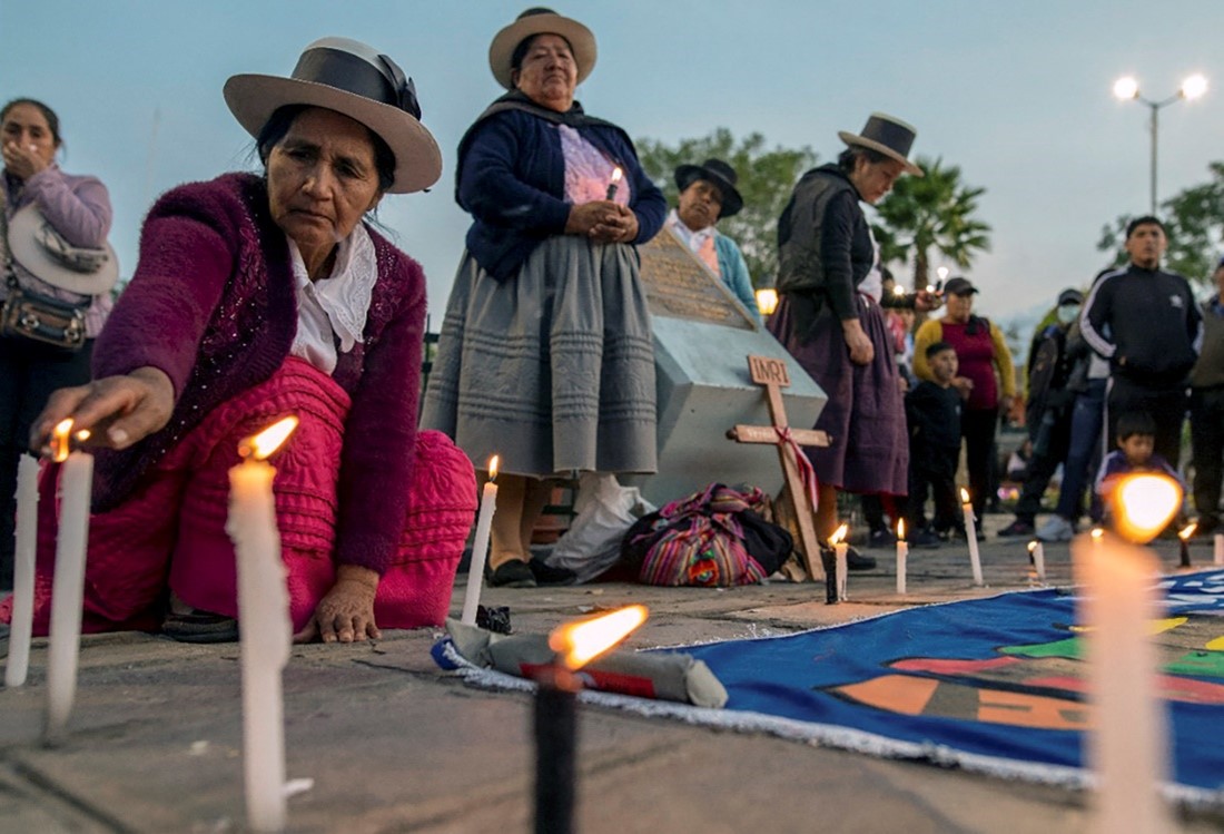 Indigenous women in Ayacucho light candles for protestors killed in the last month in Peru. 
Credit: JAVIER ALDEMAR/AFP via Getty Images
