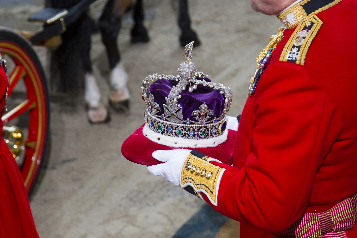 Imperial state crown being carried from Parliament
