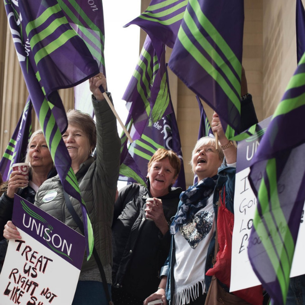 Care Workers for Change protesting pay cuts