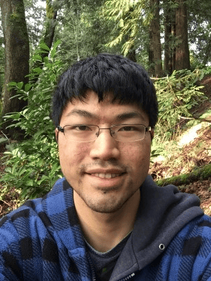CPAWS supporter, Leslie Ngo, standing in the woods.