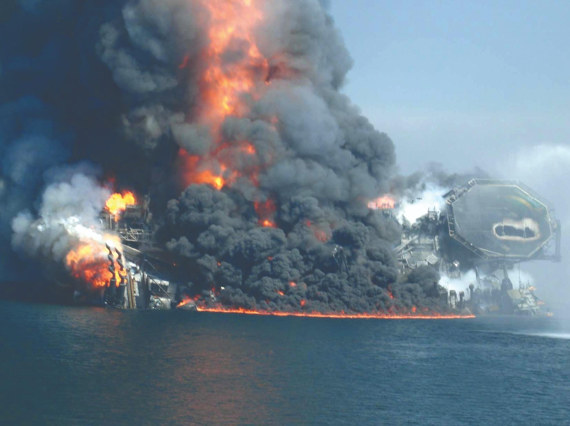 Deepwater Horizon Platform tumbling down on fire just after the accident. Ground Zero, Mississippi, USA. April 2010.