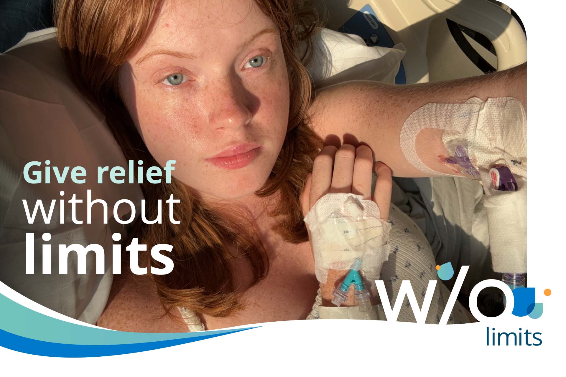 A woman with ginger hair laying on a hospital bed.