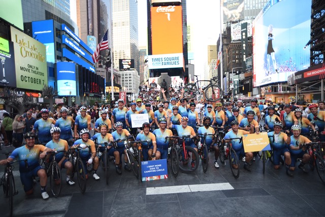 group of riders in times square