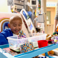 child in hospital smiling