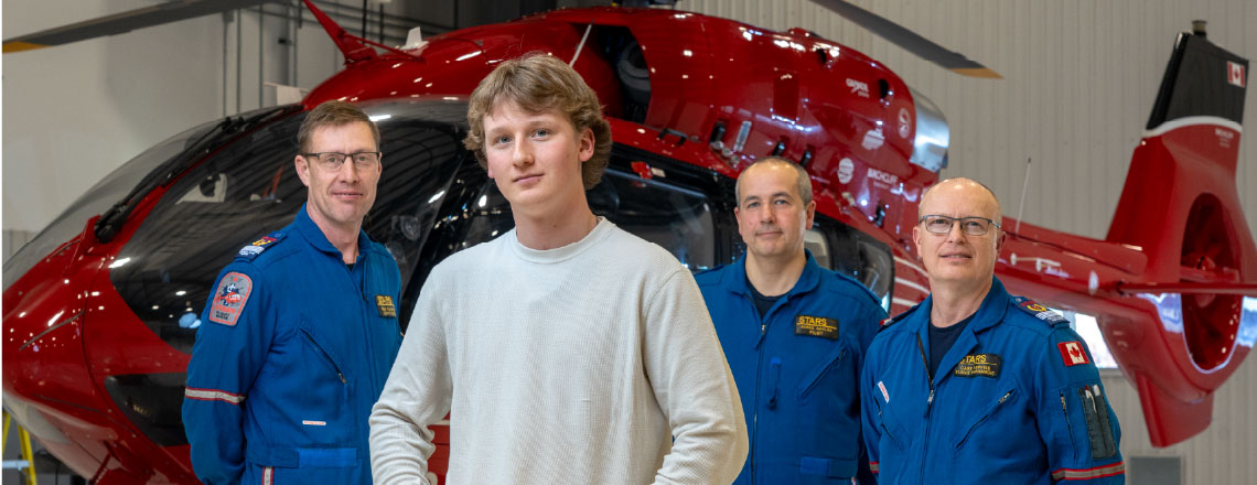 Portrait of STARS Very Important Patient Jacquie Drew and her Crew in the STARS Hangar