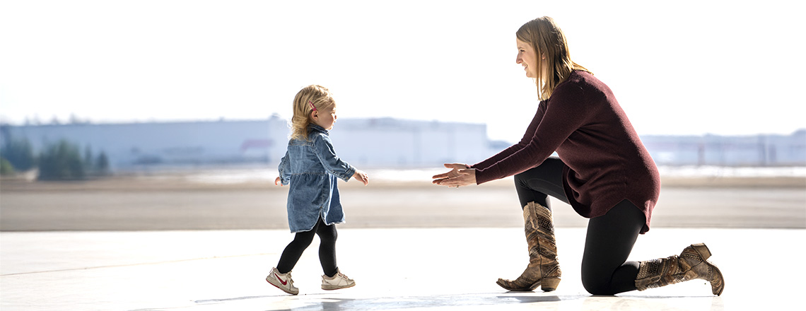 Portrait of STARS Very Important Patient Christine Aarsby and her daughter Addie in STARS Hangar