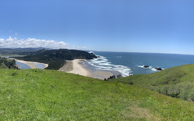 Expansive view from the Cascade Head Grasslands overlooking a beach and the Pacific Ocean. © Molly Dougherty/TNC