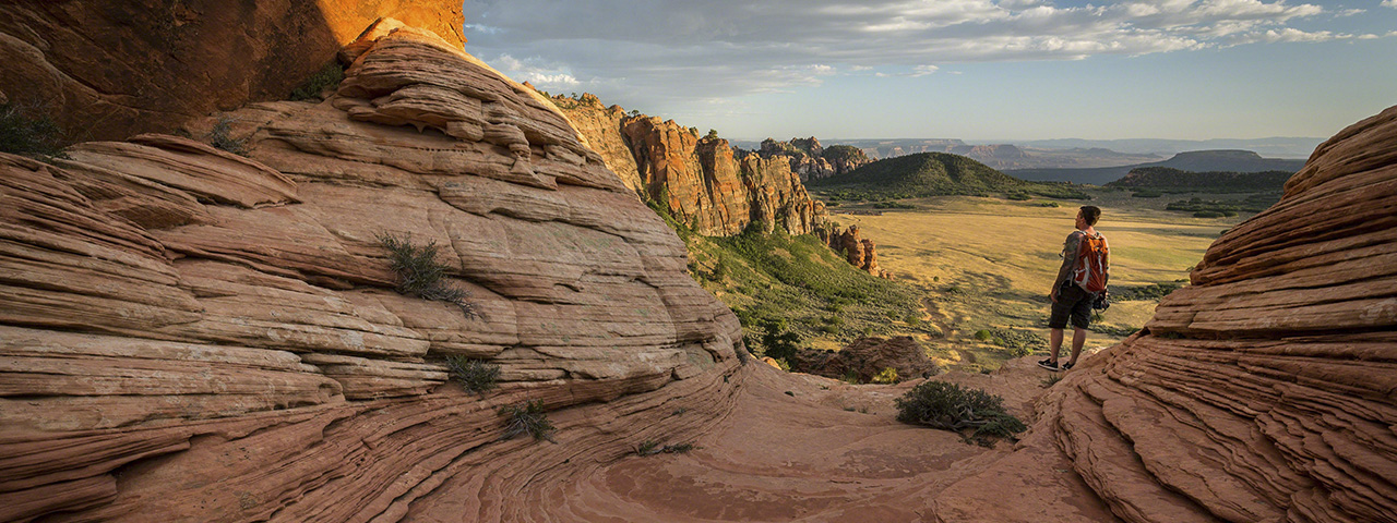 A backpacker hikes in the Kolob Canyons in the northwest section of Zion National Park in Utah. &copy; Adam Elliott /TNC Photo Contest 2019