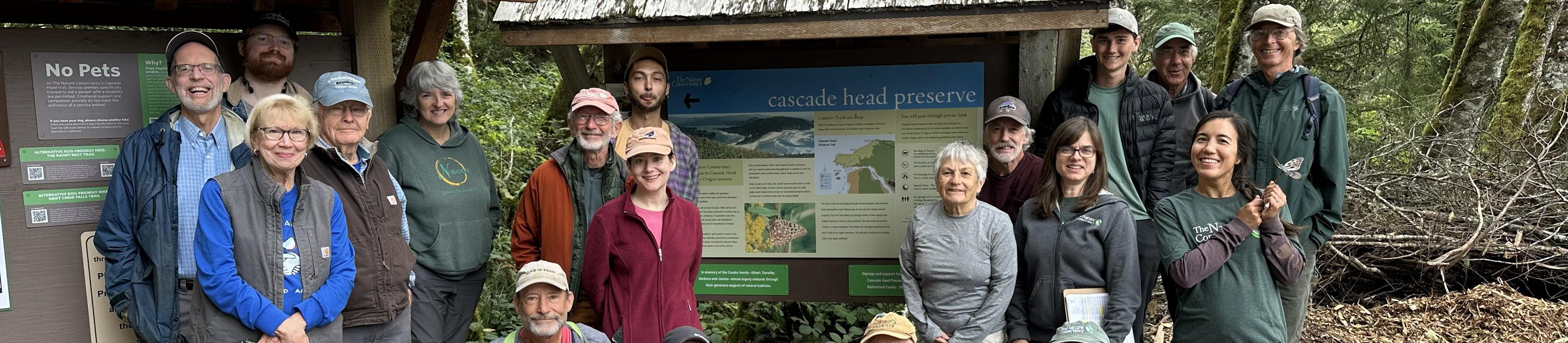 Volunteers gather for a group photo at Cascade Head Trailhead. © Sandra Farrell