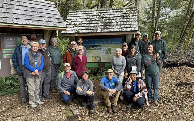 Volunteers gather for a group photo at Cascade Head Trailhead. © Sandra Farrell