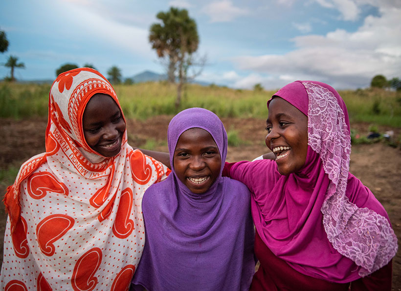 Smiling girls at Lagosa Secondary School, part of the Tuungane Project in western Tanzania. &copy; Roshni Lodhia