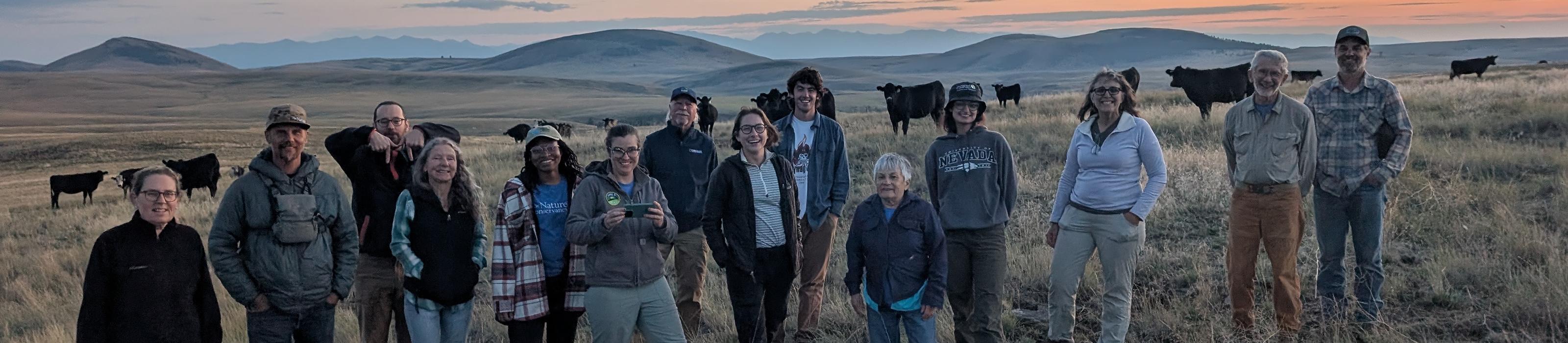 A group of volunteers pose for a photo in the landscape at Zumwalt Prairie Preserve. © Sandra Farrell/TNC