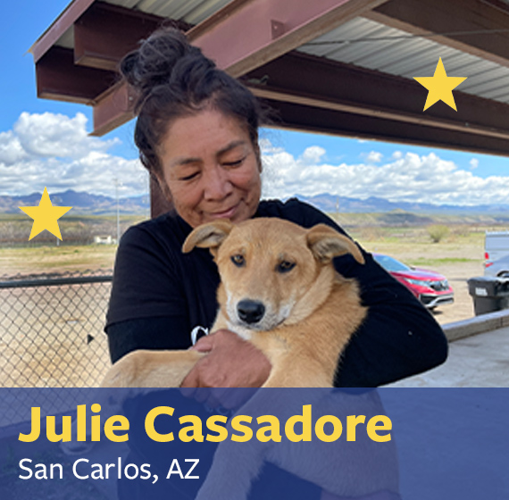 Julie Cassadore holding a dog
