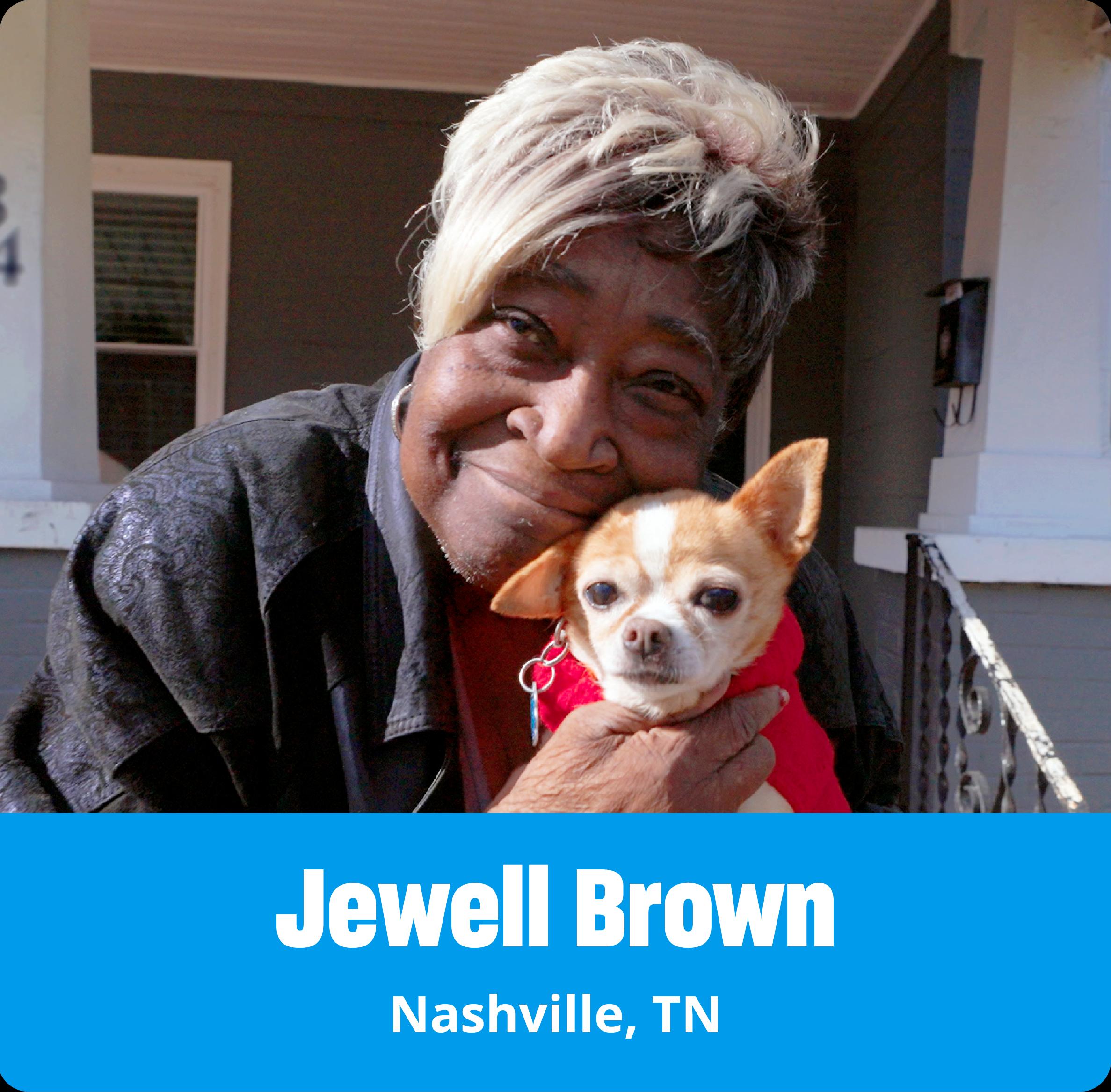Jewell Brown holding a dog