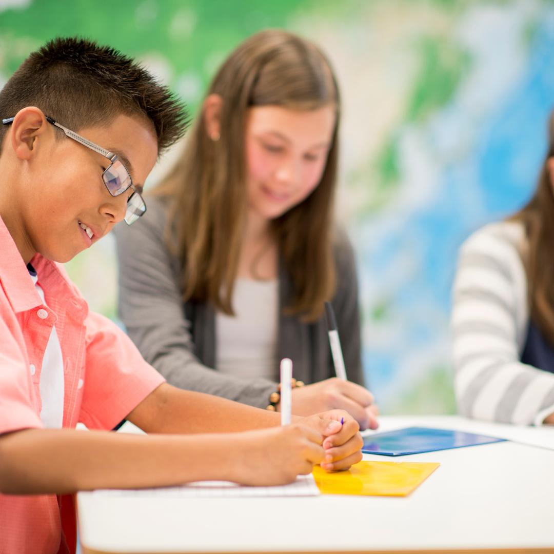 This is an image of children writing.