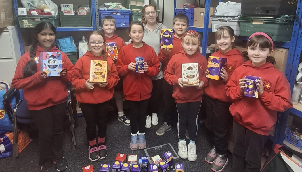 This is a photo of the Mini Vinnies with their Easter egg donations