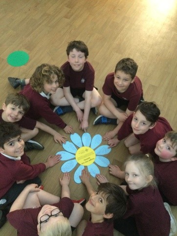 This is a photo of more Mini Vinnies around their forget-me-not flower