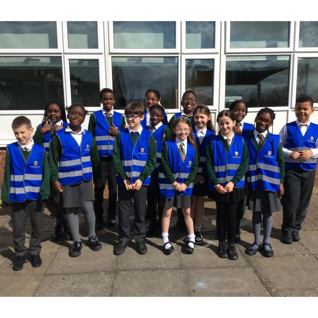 This is an image of the children in their hi vis jackets for litter picking