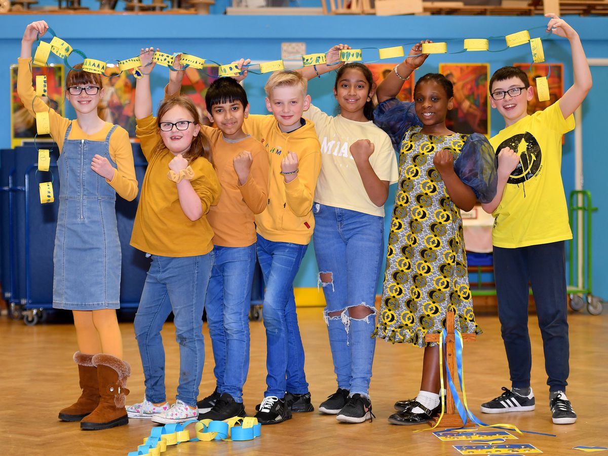 This is a photo of the Mini Vinnies in their blue and yellow clothing to support Ukraine