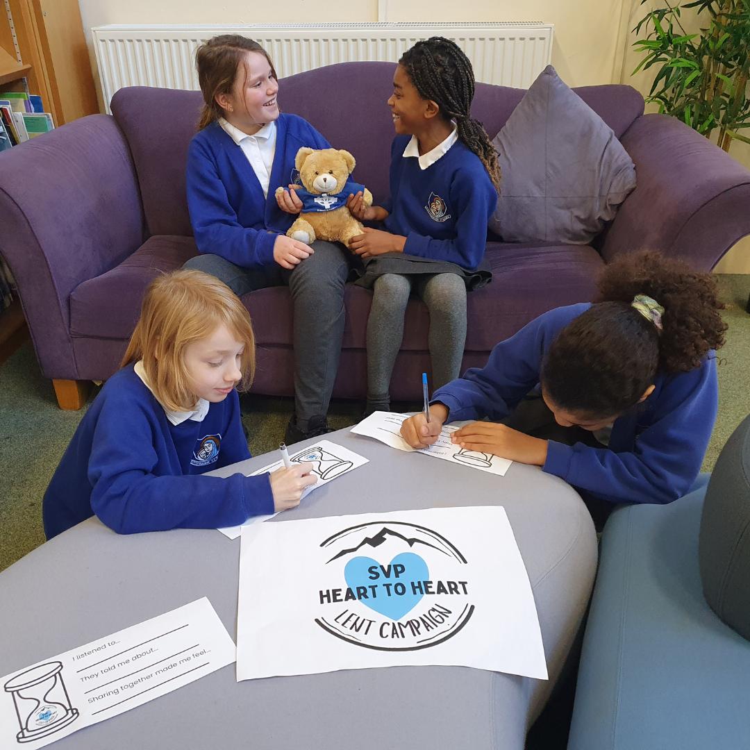 This is an image of 4 children with the resources for week 3 of the campaign