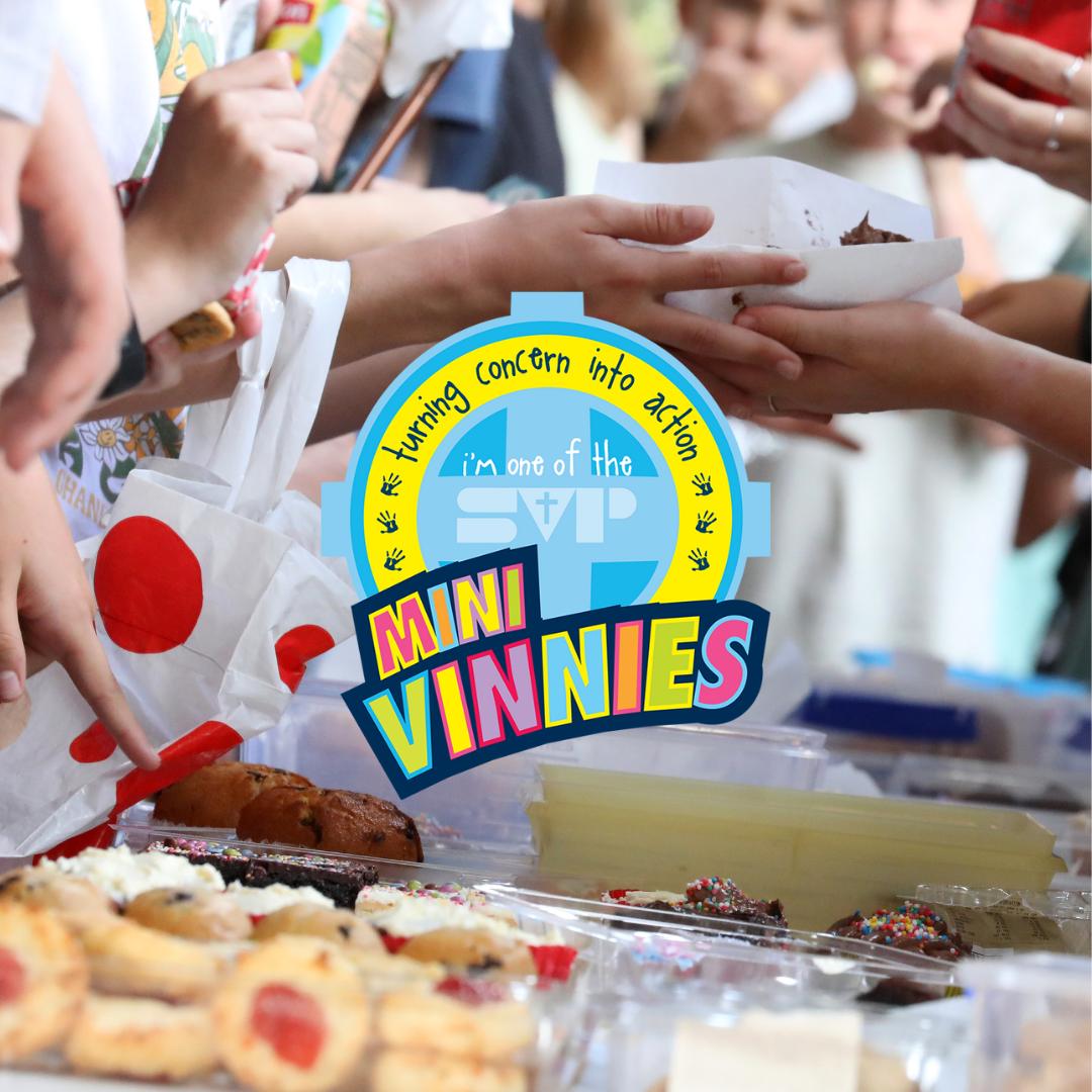 This is a picture of a bake sale with the Mini Vinnies logo on top.