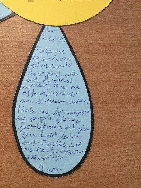 This is a picture of a prayer written on a forget-me-not petal