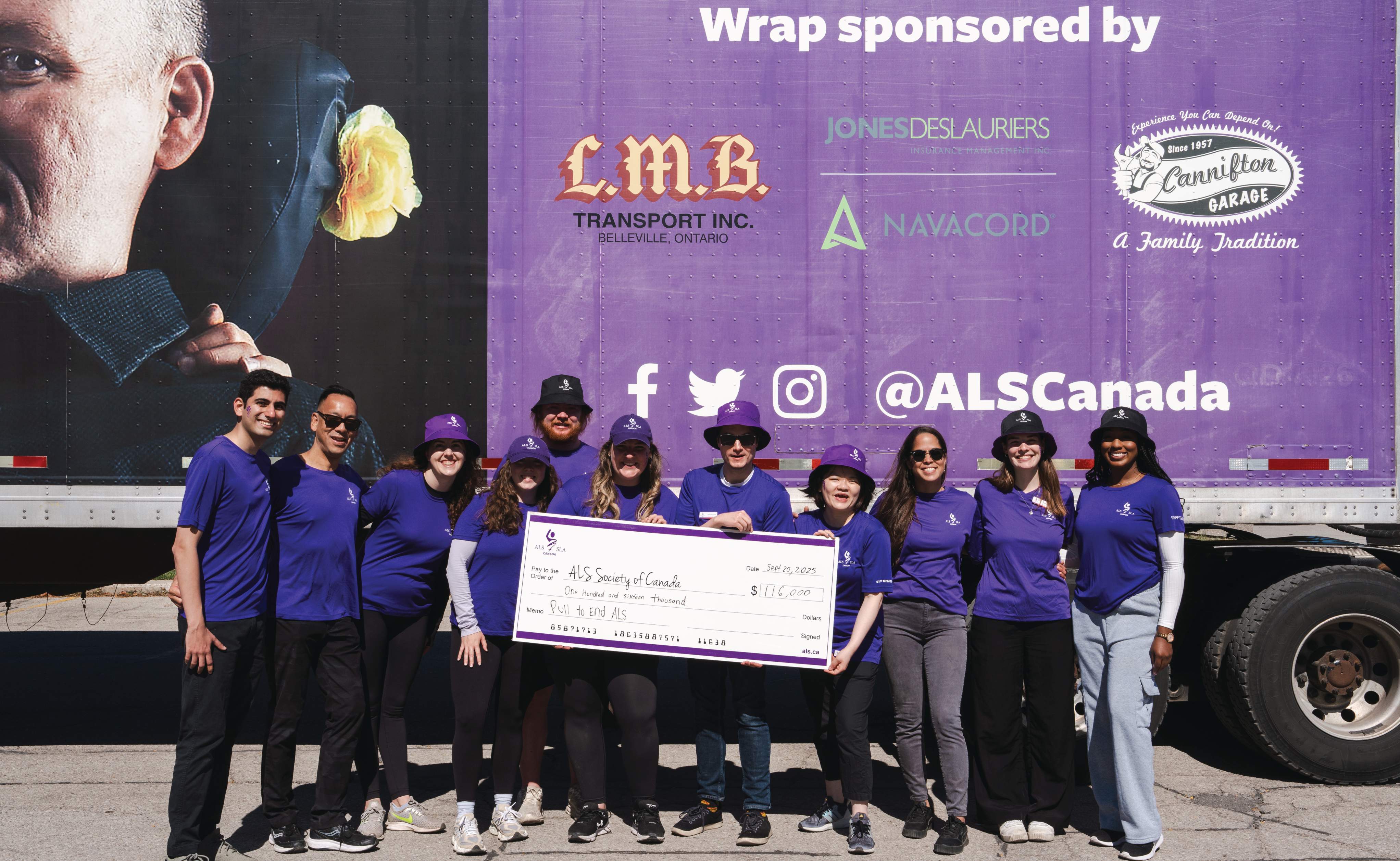 Participants pulling a truck at Pull to End ALS