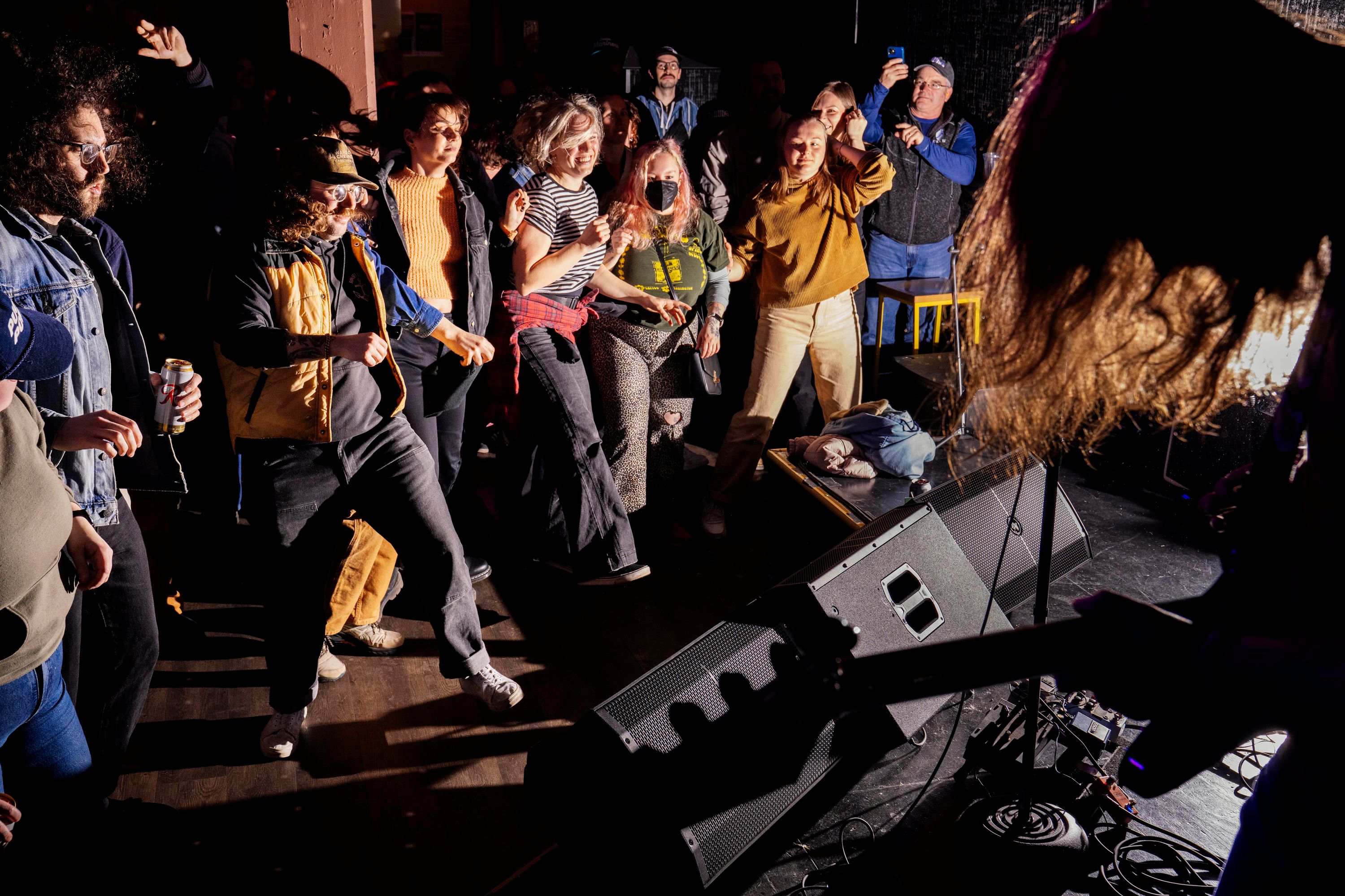 A crowd dances at a concert