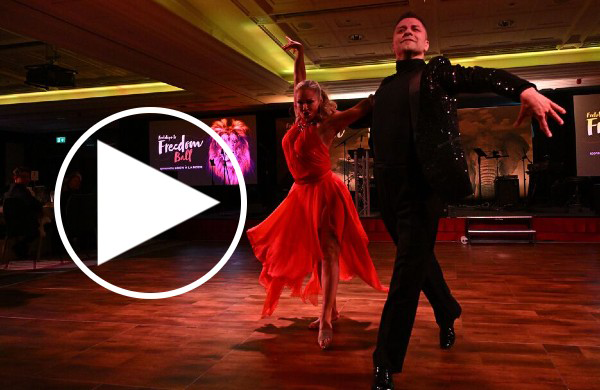 Dancers at Footsteps to Freedom Gala 2026 with a play button overlaid - click to watch the video highlights