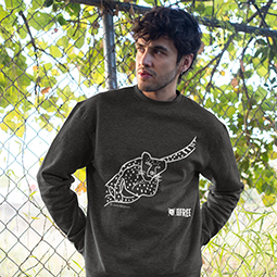 A man in a black sweatshirt with white cheetah drawing
