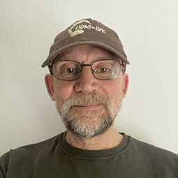 A head and shoulder profile photo of Dr Mark Jones