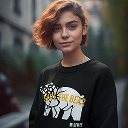 Woman in a black sweatshirt with white bear motif