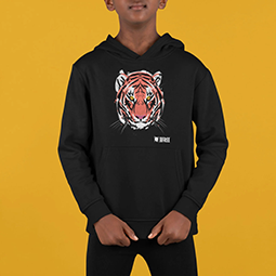 A young boy in a black hoodie with a tiger on it