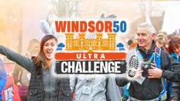 A photo of a group of happy walkers with the Windsor 50 Challenge logo overlaid.