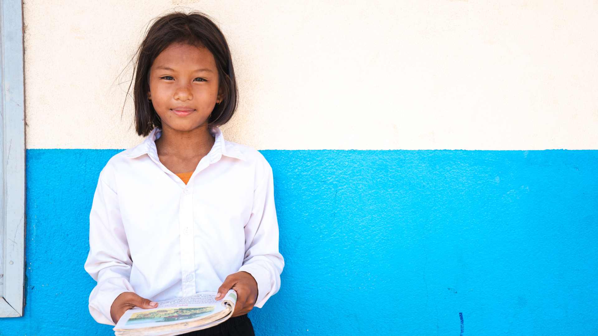 Photo: Plan International works with local partners to help girls complete their education, like Muta who lives in Cambodia