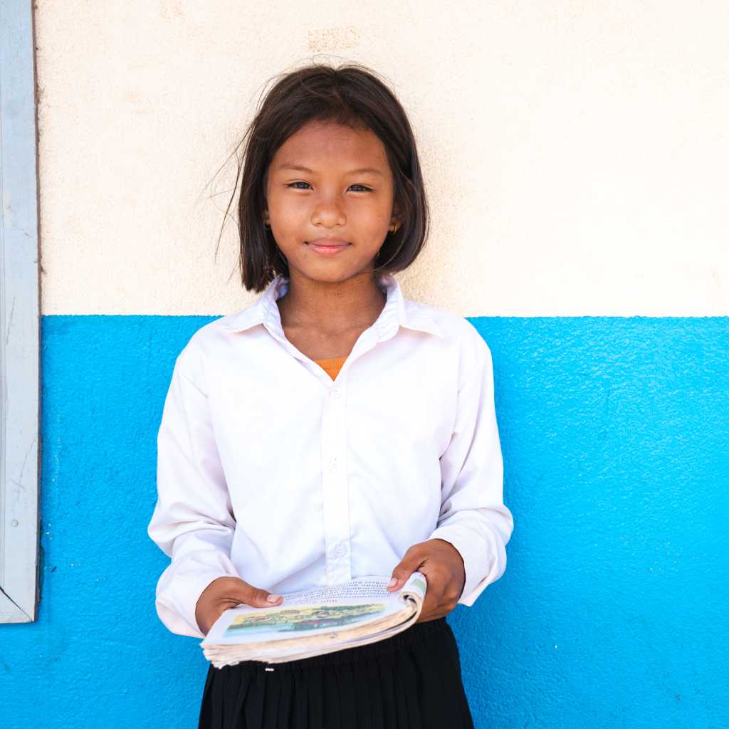 Photo: Plan International works with local partners to help girls complete their education, like Muta who lives in Cambodia