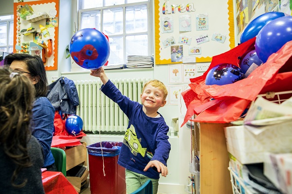 Boy playing in nursery
